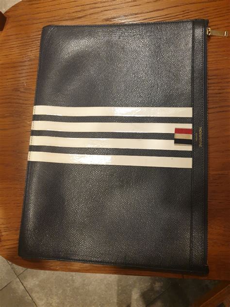 thom browne clutch bag replica|thom browne where to buy.